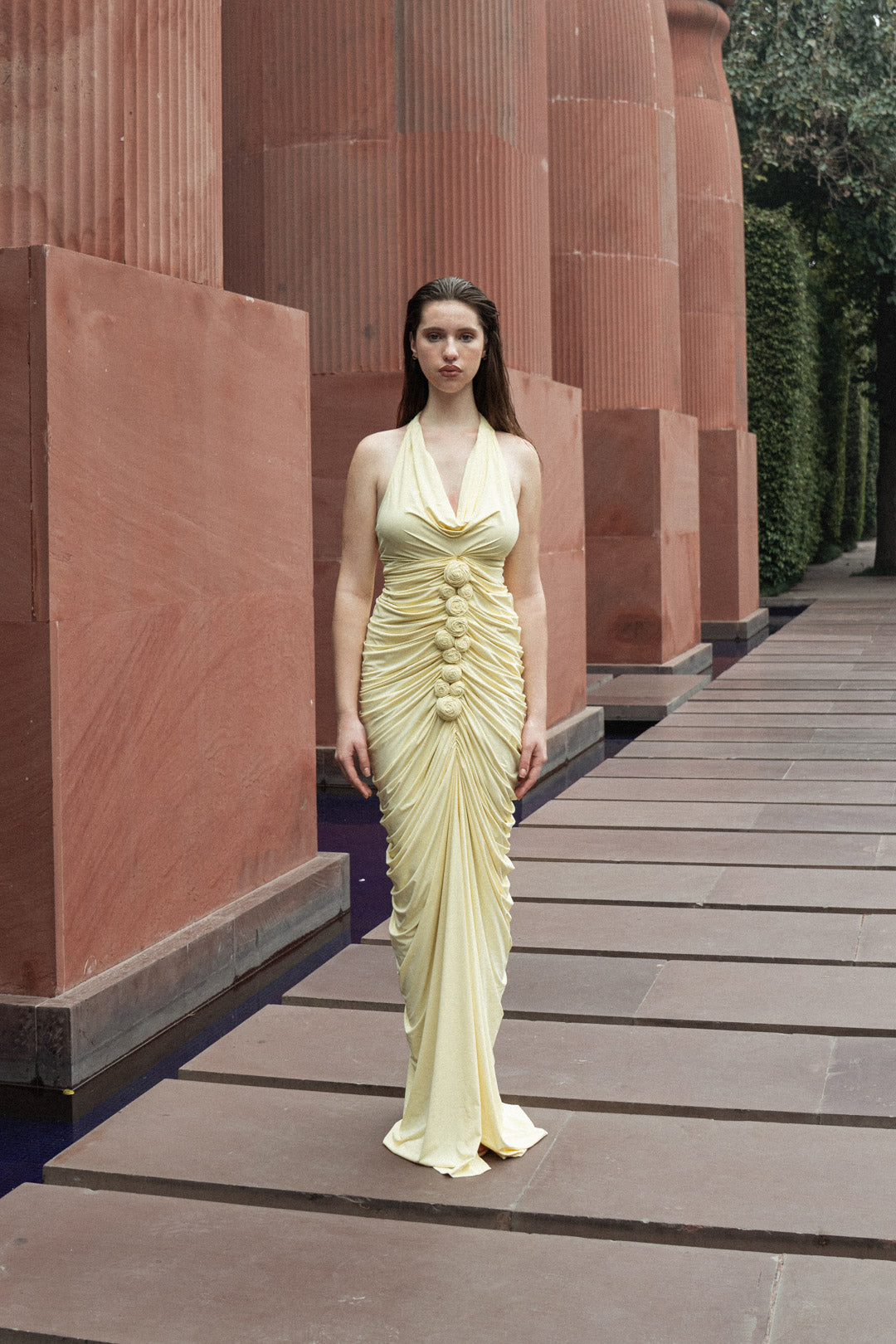 BUTTER YELLOW GATHERED HALTER GOWN WITH ROSE EMBELLISHMENTS
