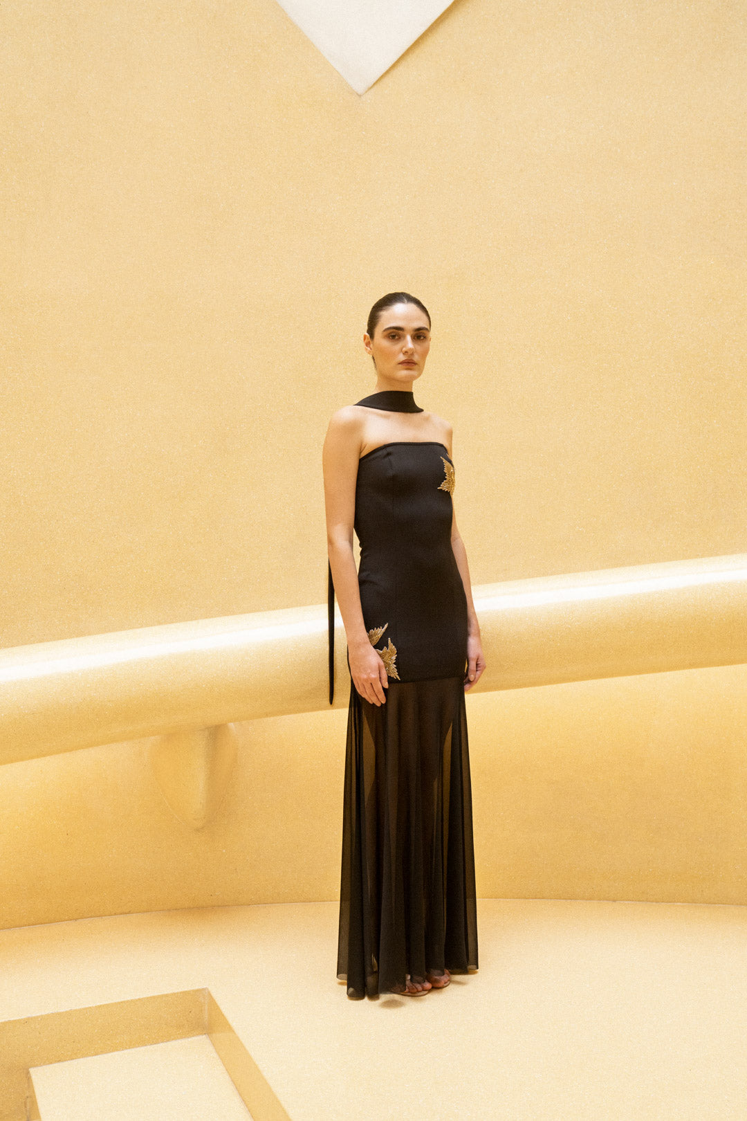 BLACK STRAPLESS SHEER PANEL GOWN WITH GOLD EMBROIDERY