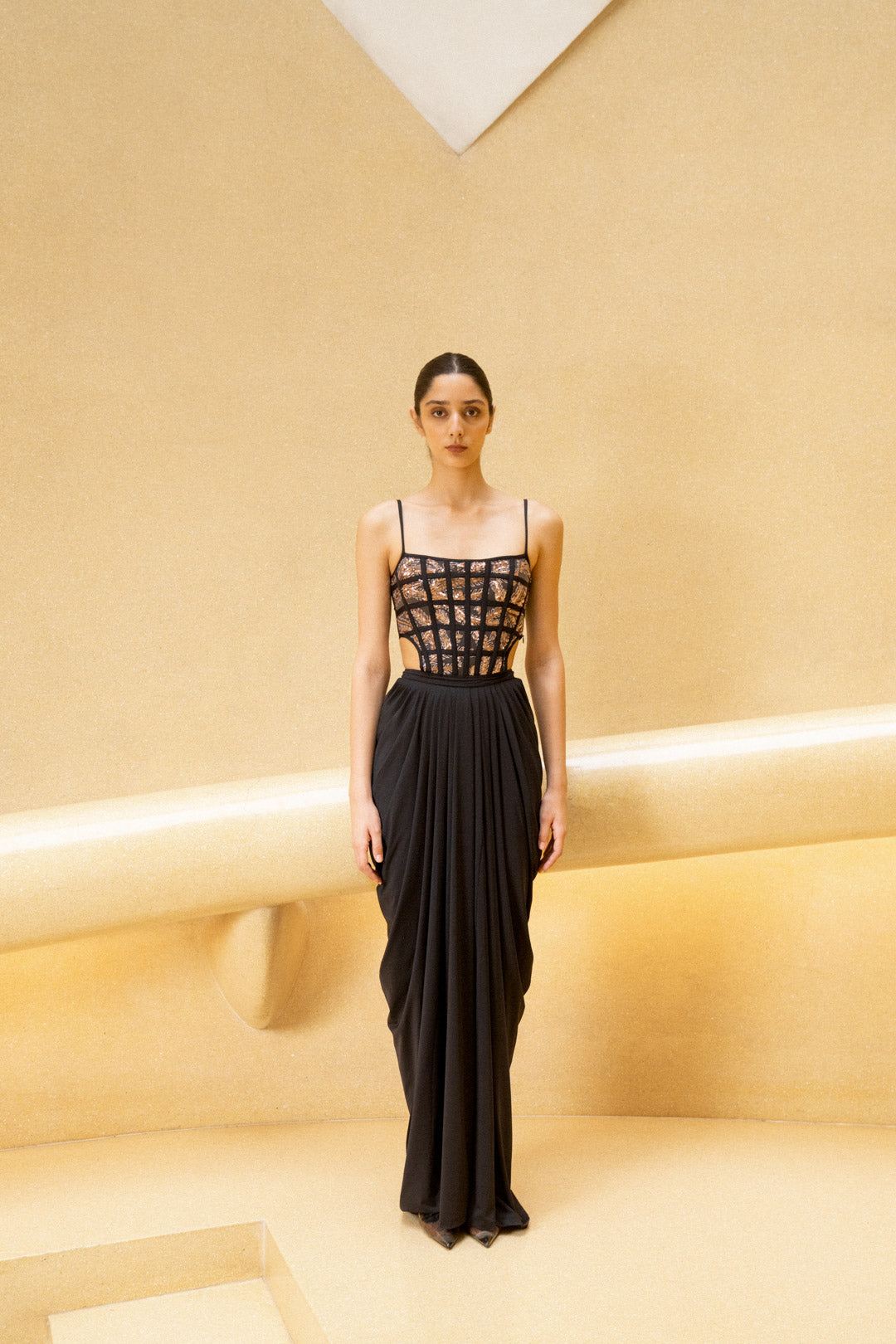 BLACK DRAPED GOWN WITH GRID CORSET BODICE