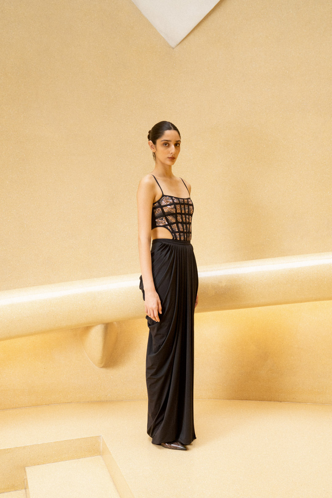 BLACK DRAPED GOWN WITH GRID CORSET BODICE