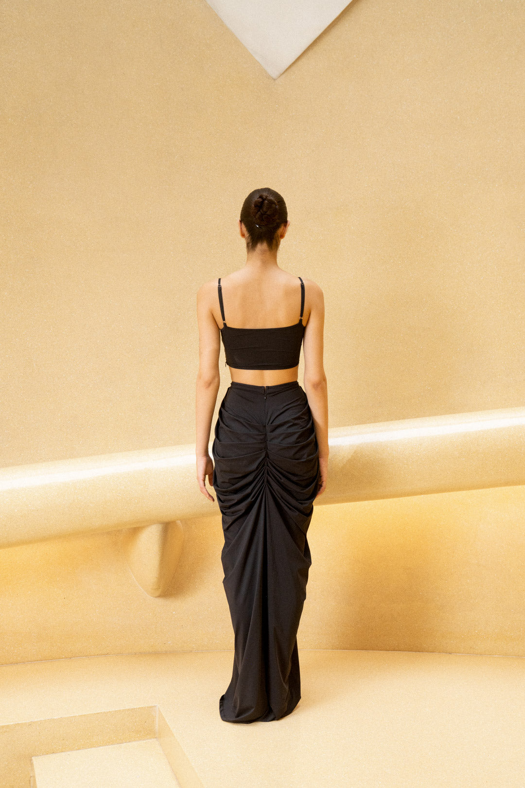 BLACK DRAPED GOWN WITH GRID CORSET BODICE