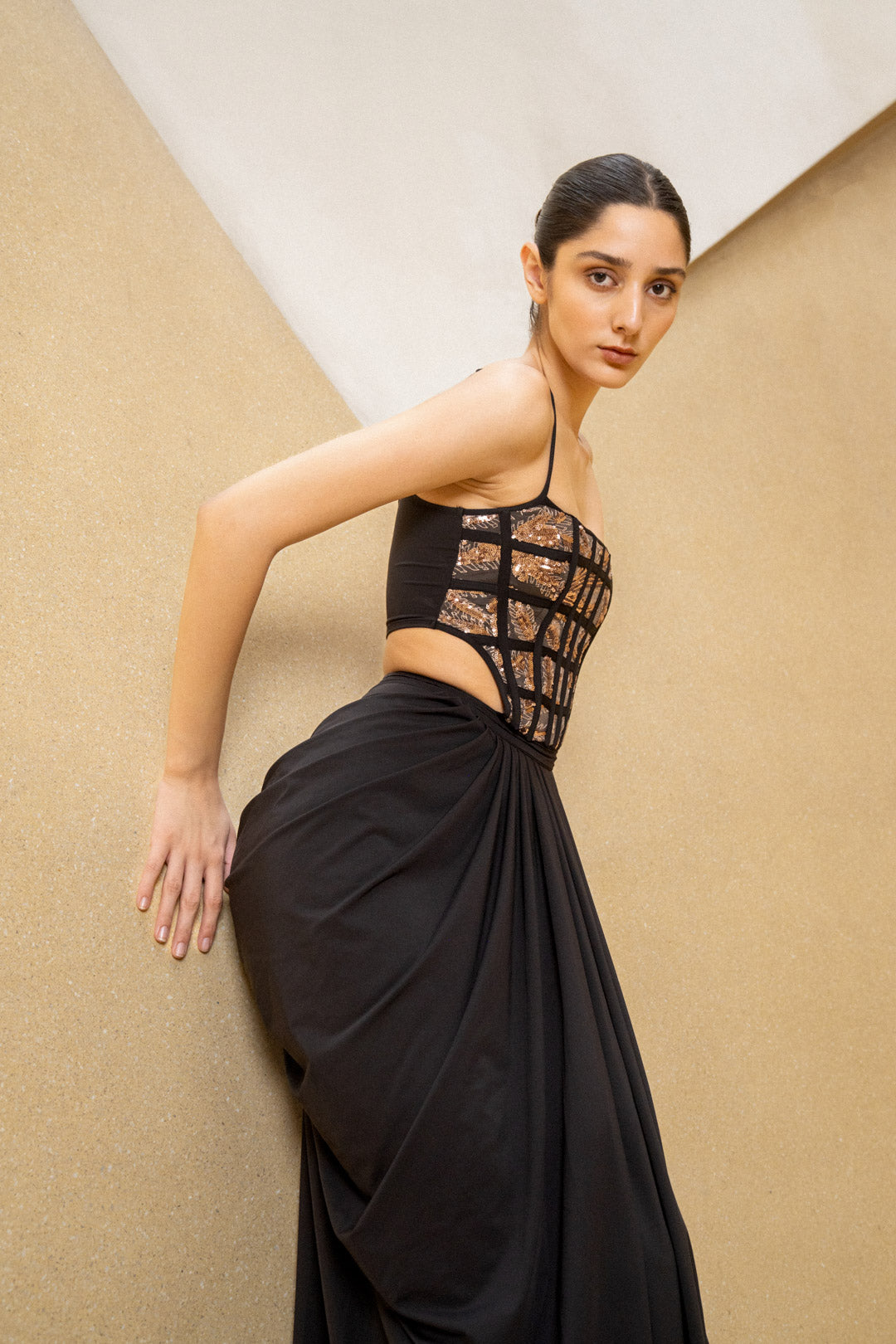 BLACK DRAPED GOWN WITH GRID CORSET BODICE