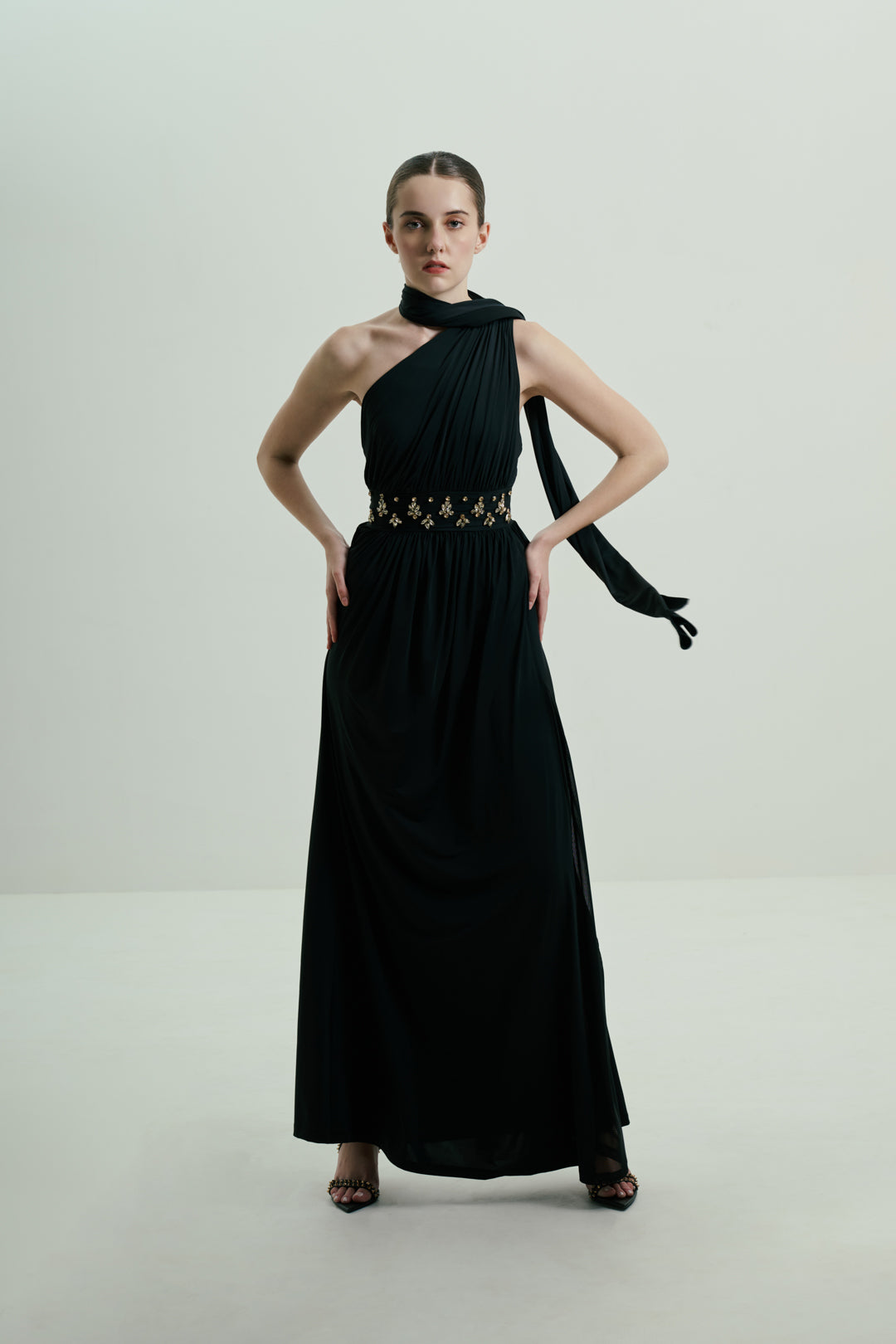 BLACK ONE-SHOULDER DRAPED GOWN WITH EMBELLISHED WAIST