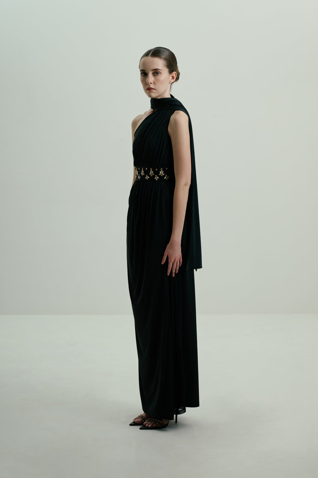 BLACK ONE-SHOULDER DRAPED GOWN WITH EMBELLISHED WAIST
