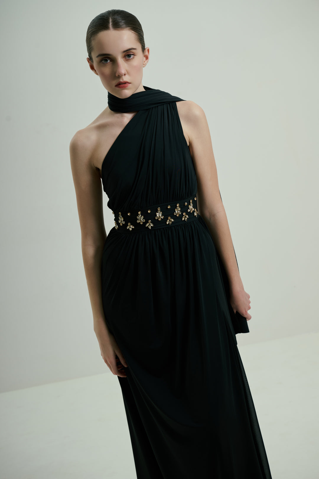 BLACK ONE-SHOULDER DRAPED GOWN WITH EMBELLISHED WAIST