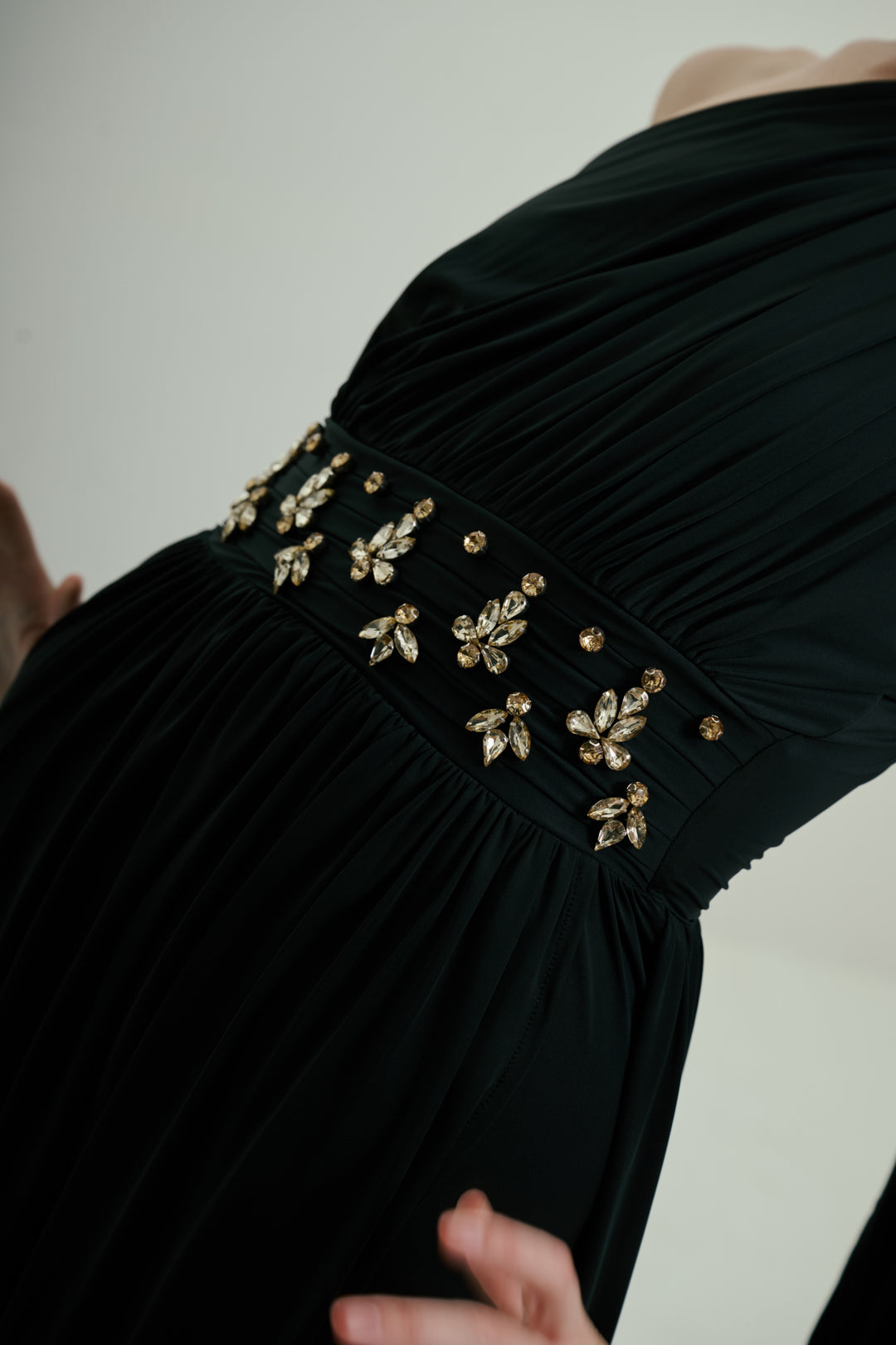 BLACK ONE-SHOULDER DRAPED GOWN WITH EMBELLISHED WAIST