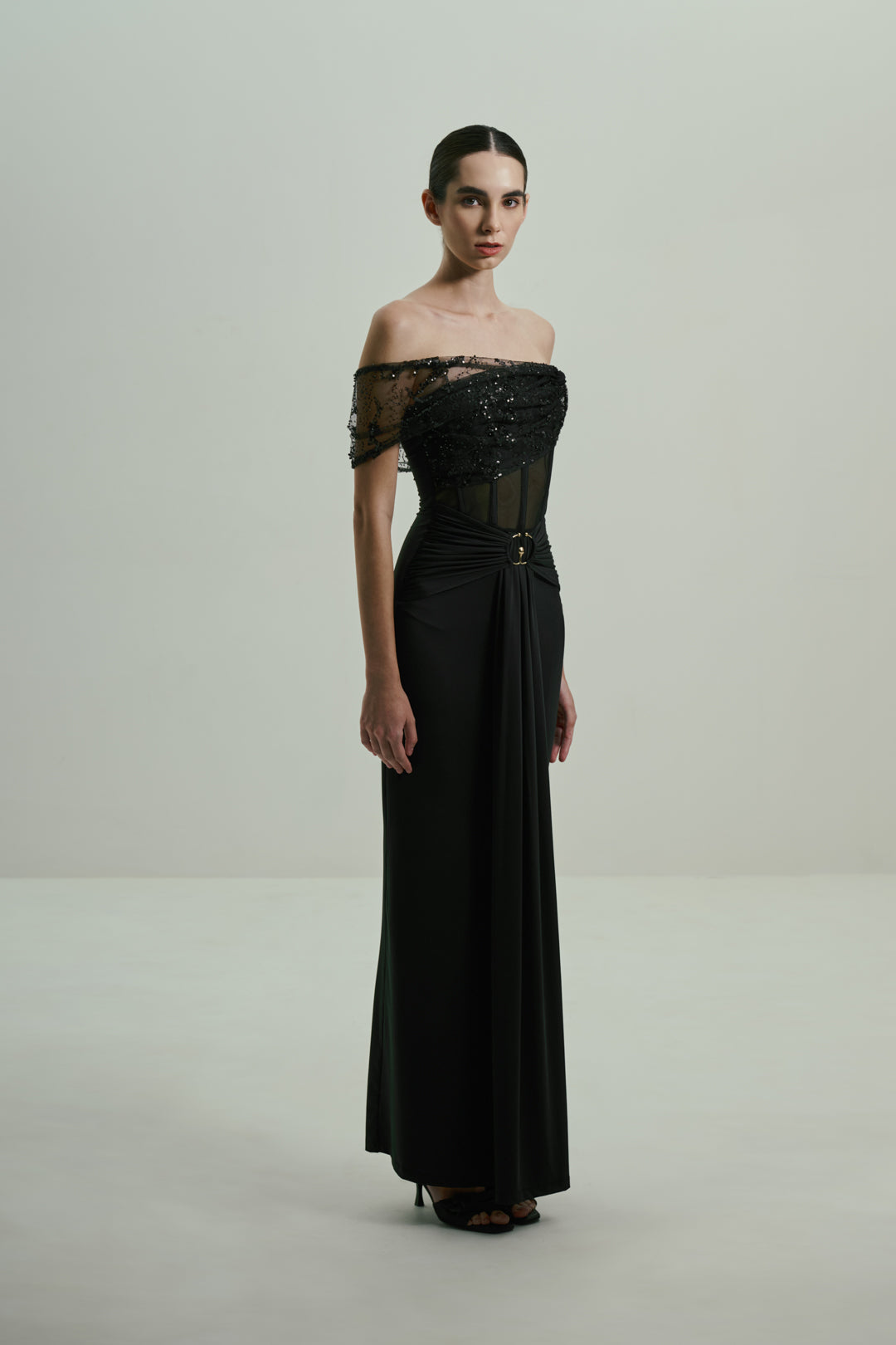 BLACK SEQUINED OFF-SHOULDER GOWN