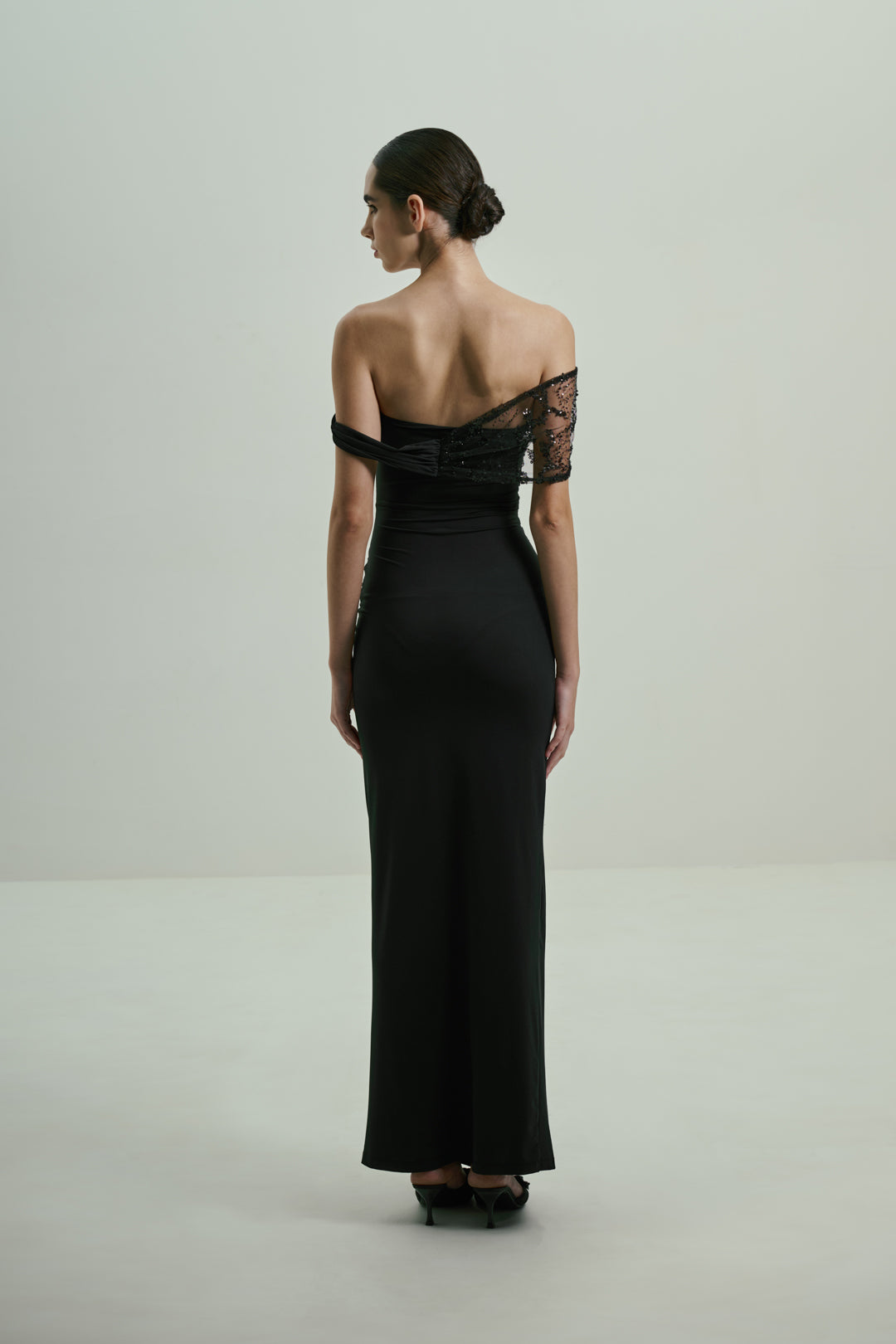 BLACK SEQUINED OFF-SHOULDER GOWN