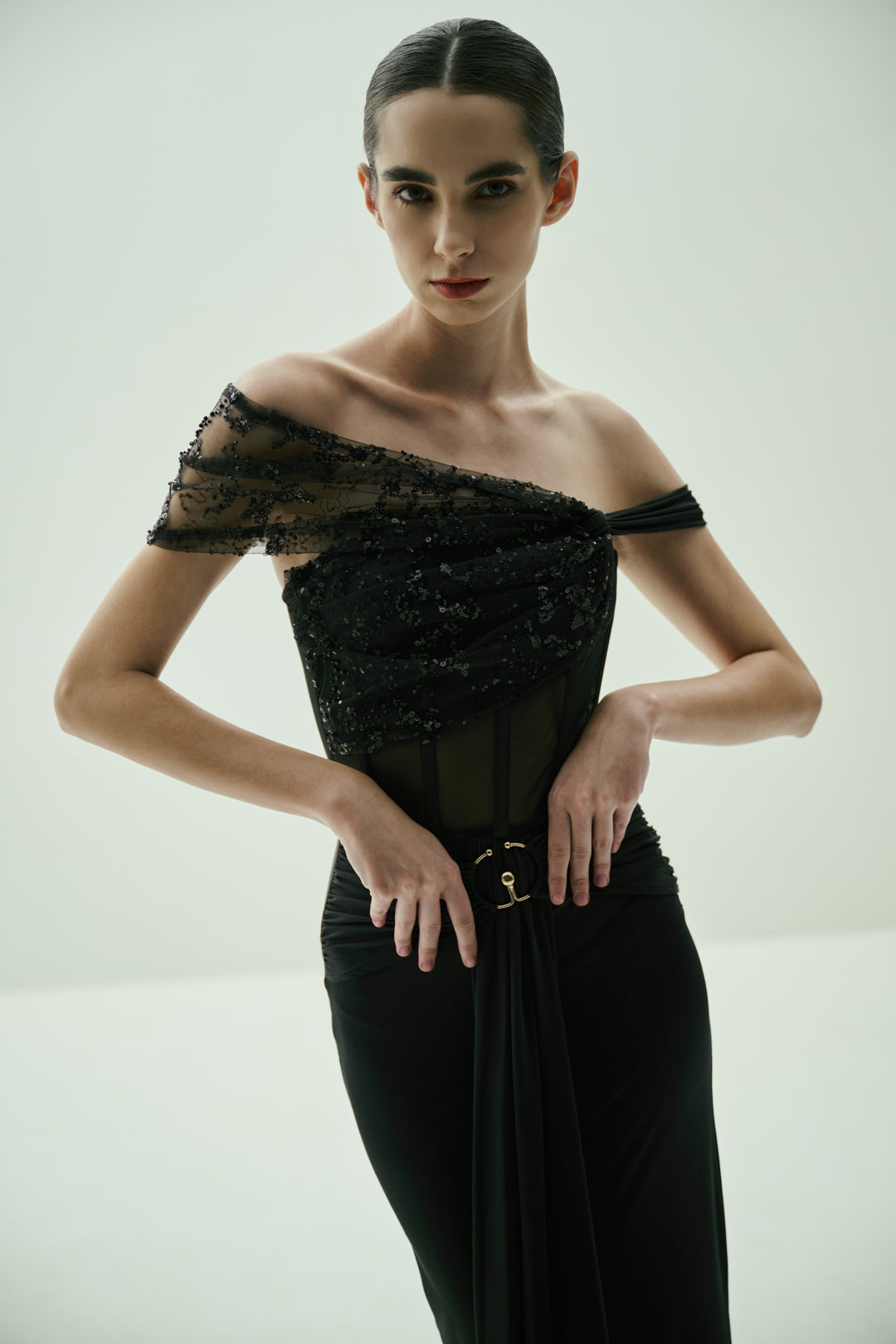 BLACK SEQUINED OFF-SHOULDER GOWN