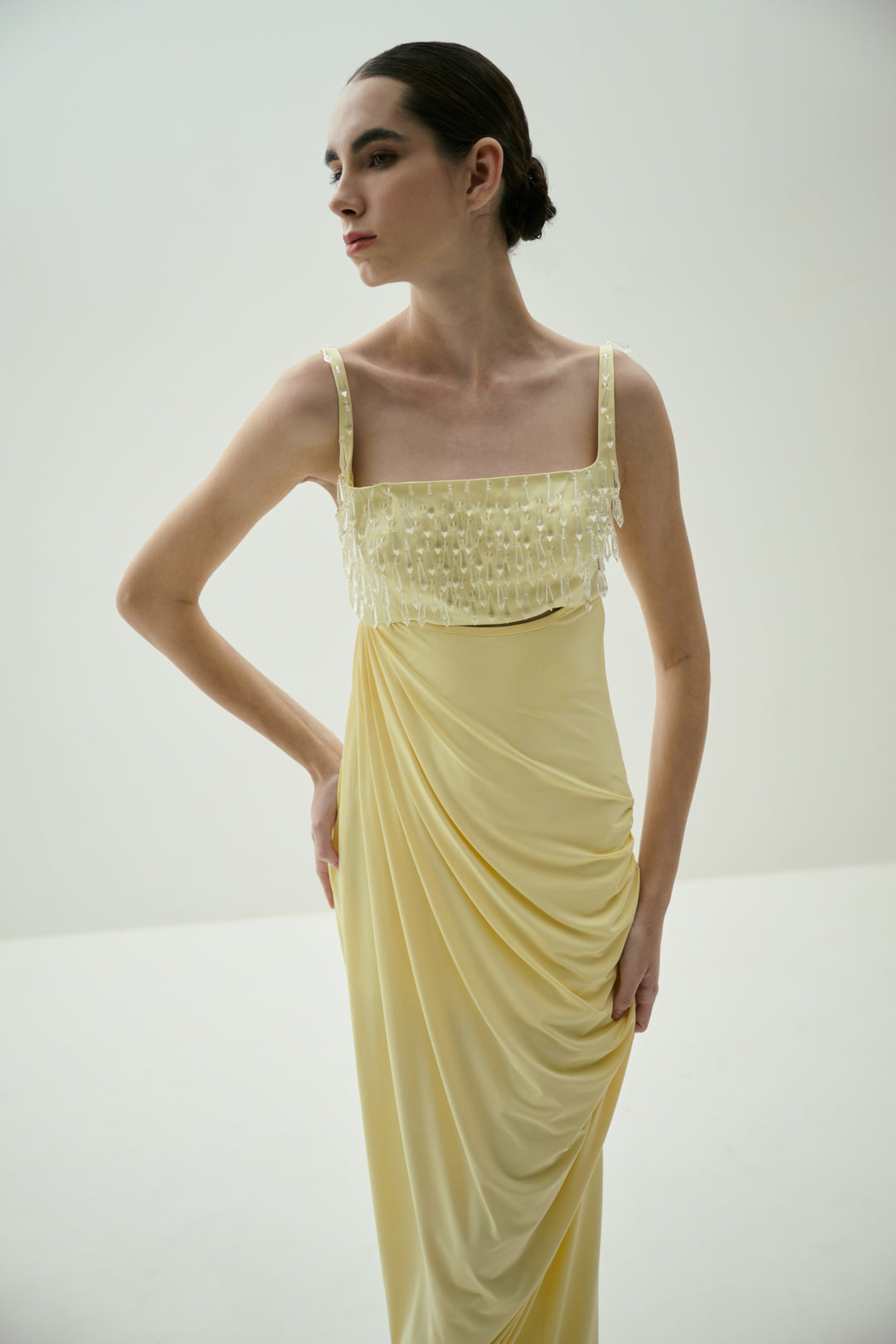 BUTTER YELLOW DRAPED GOWN WITH CRYSTAL-EMBELLISHED BUST