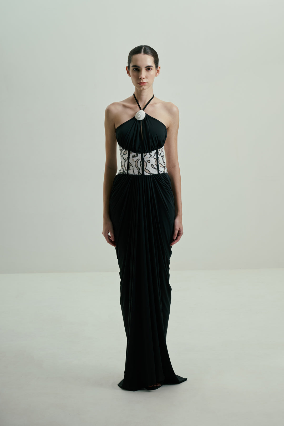BLACK DRAPED GOWN WITH MONOCHROME SEQUIN CORSET