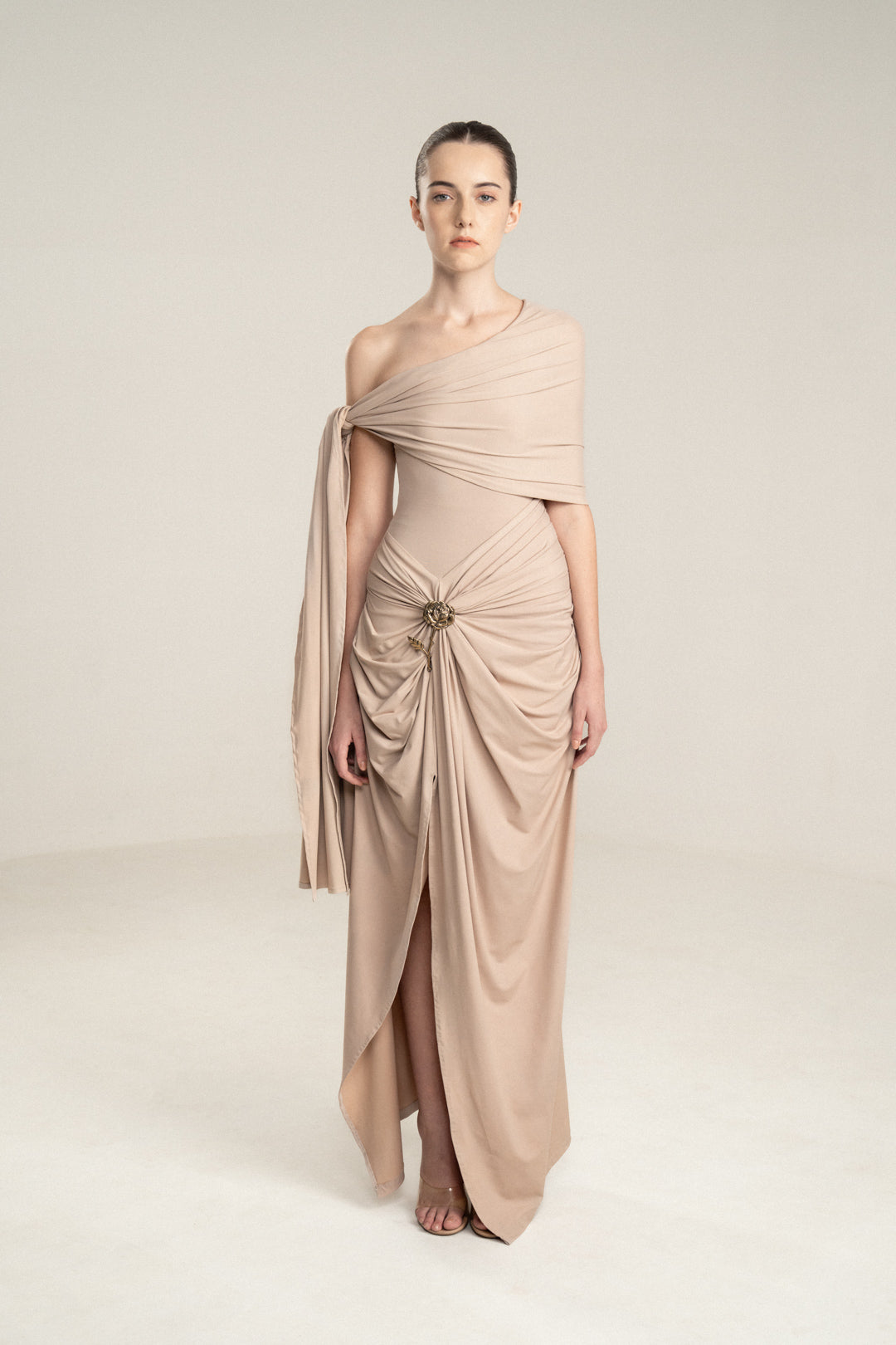 ONE-SHOULDER DRAPED DRESS WITH GOLD FLOWER DETAIL