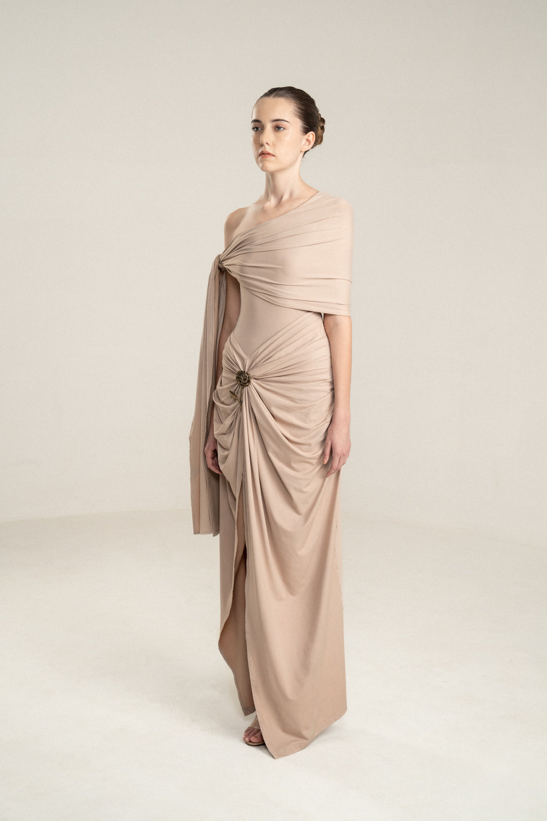 ONE-SHOULDER DRAPED DRESS WITH GOLD FLOWER DETAIL