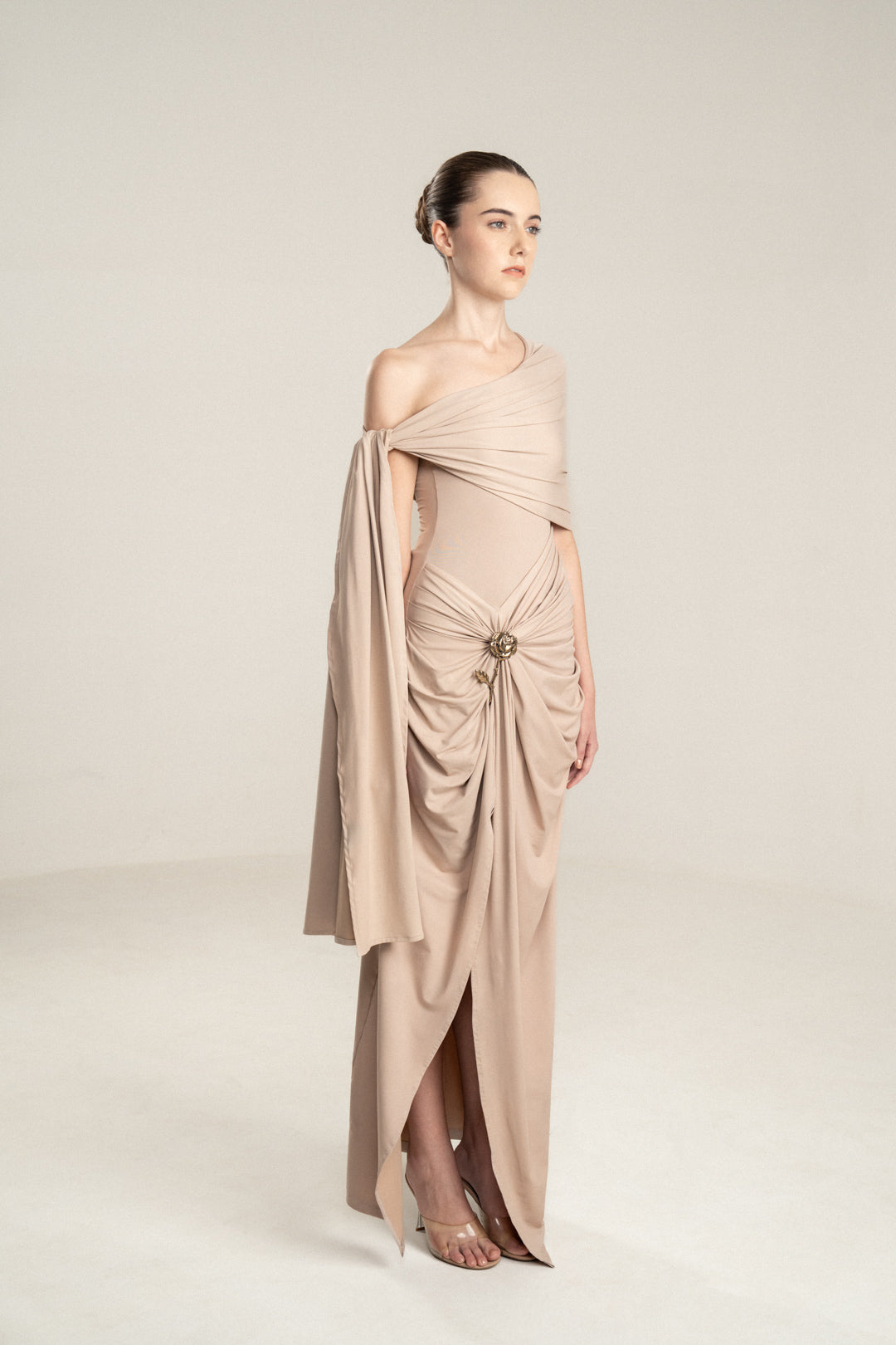 ONE-SHOULDER DRAPED DRESS WITH GOLD FLOWER DETAIL