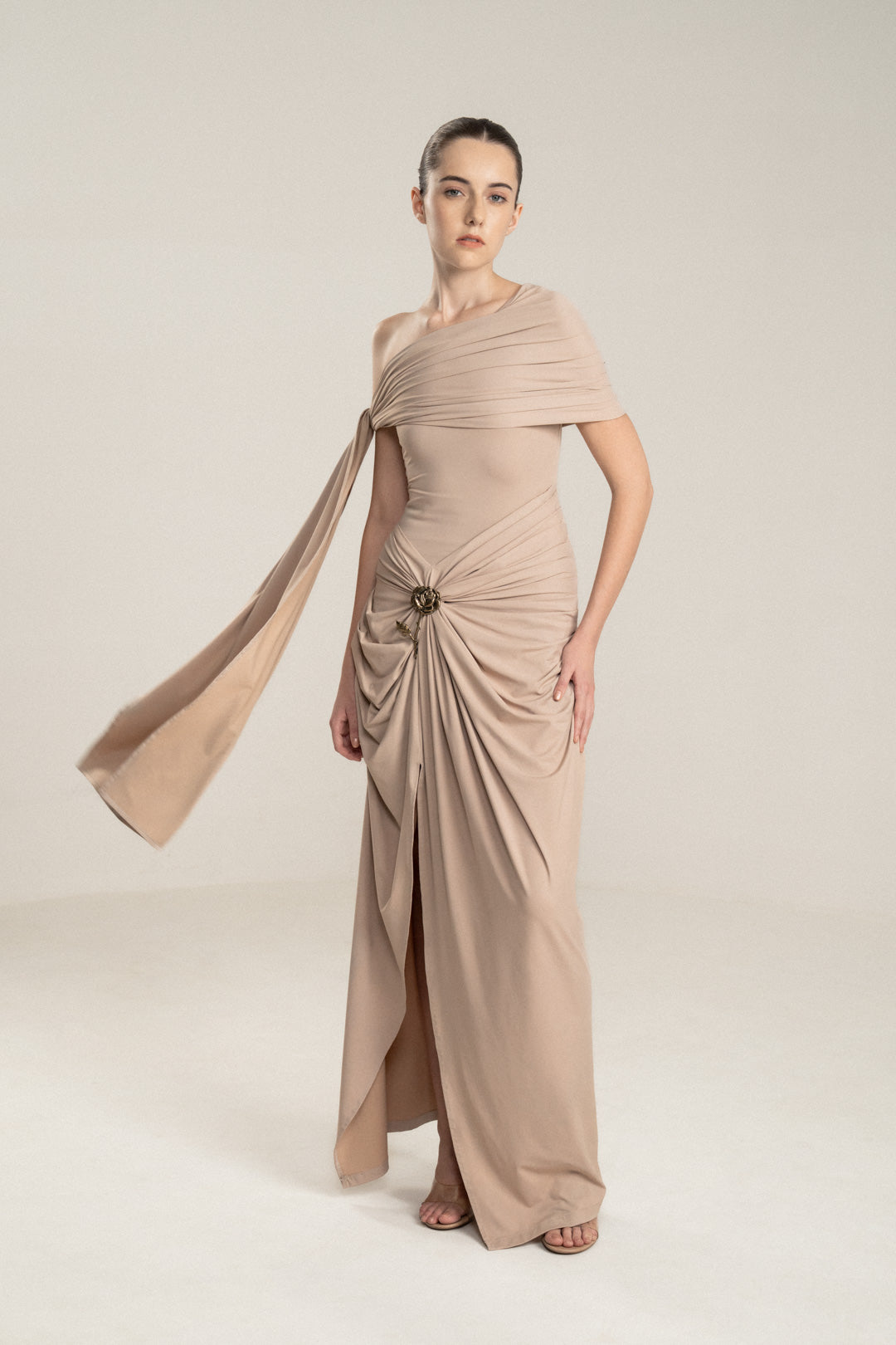 ONE-SHOULDER DRAPED DRESS WITH GOLD FLOWER DETAIL