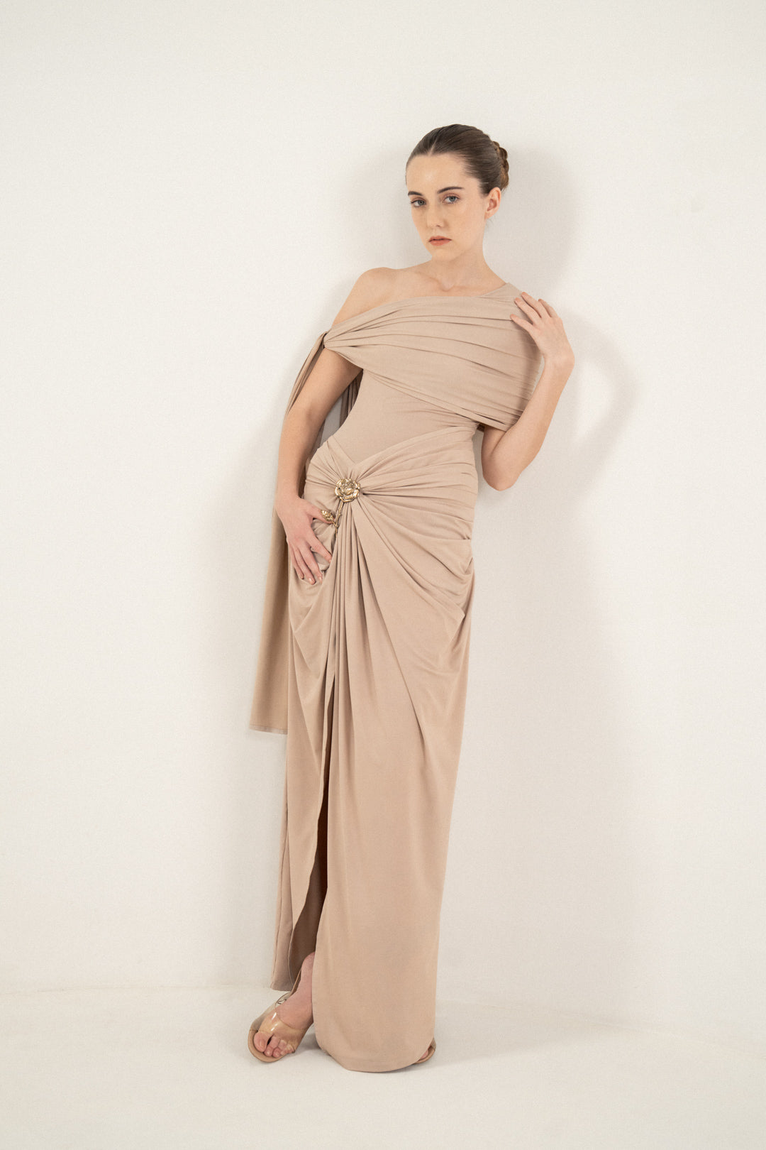 ONE-SHOULDER DRAPED DRESS WITH GOLD FLOWER DETAIL