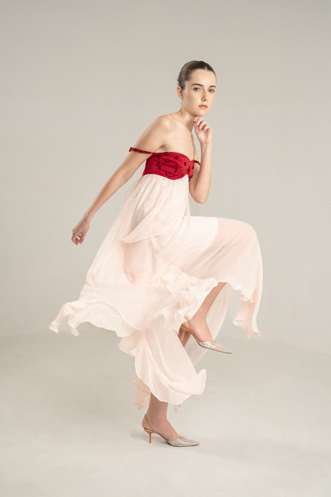 PINK FLOWING MIDI DRESS WITH RED EMBELLISHED BUSTIER