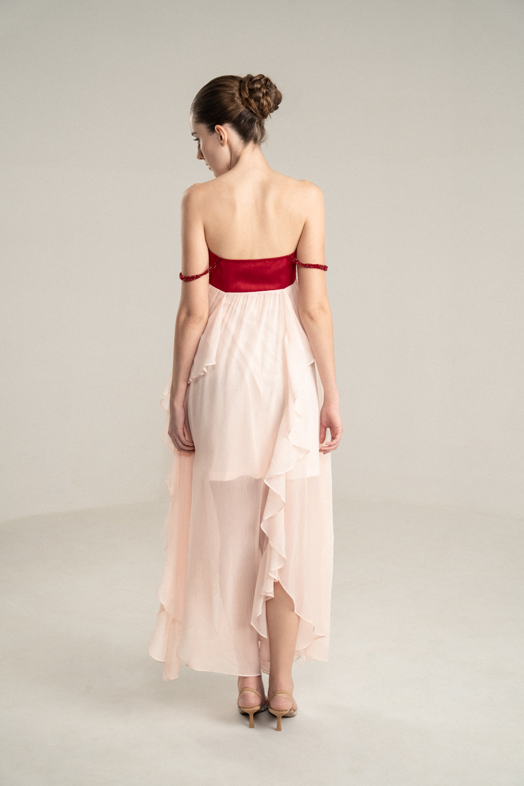 PINK FLOWING MIDI DRESS WITH RED EMBELLISHED BUSTIER