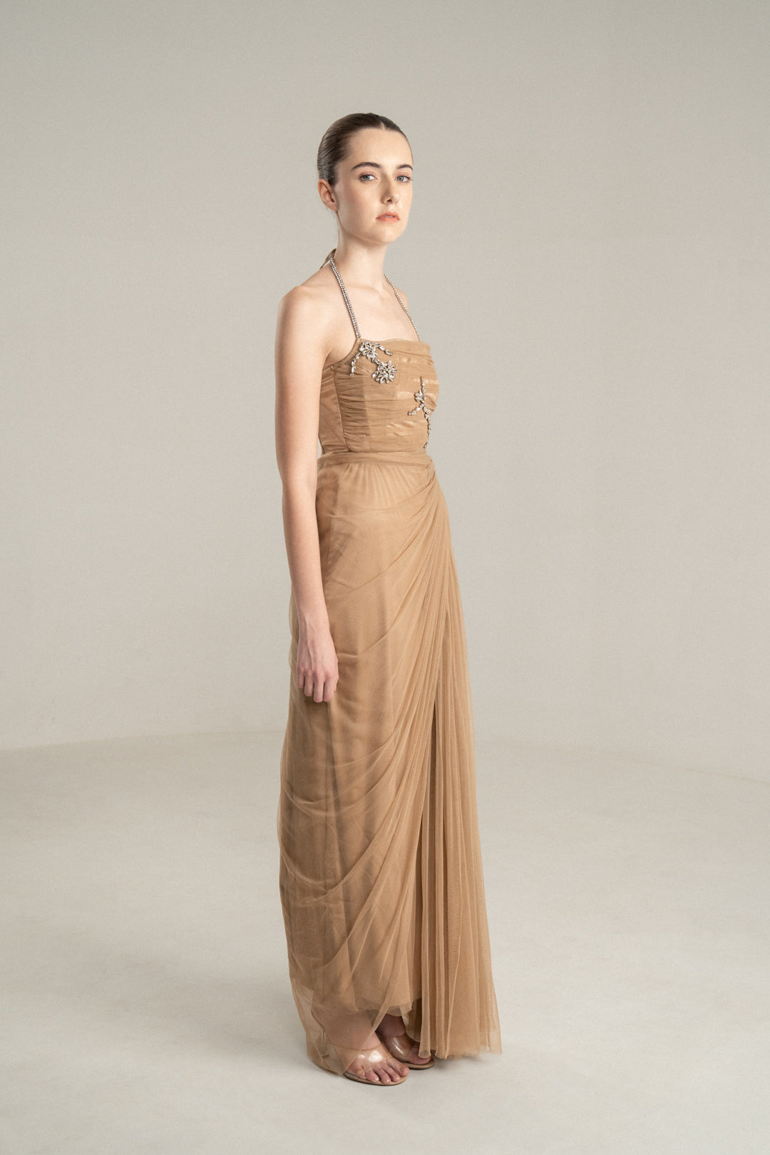BEIGE DRAPED GOWN WITH RHINESTONE EMBELLISHMENTS