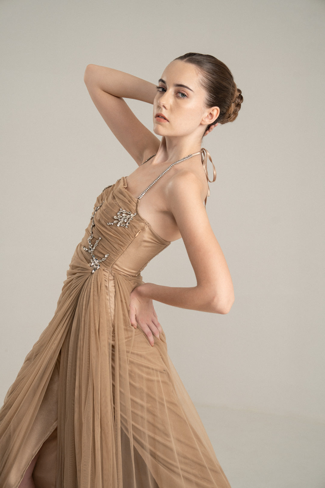 BEIGE DRAPED GOWN WITH RHINESTONE EMBELLISHMENTS