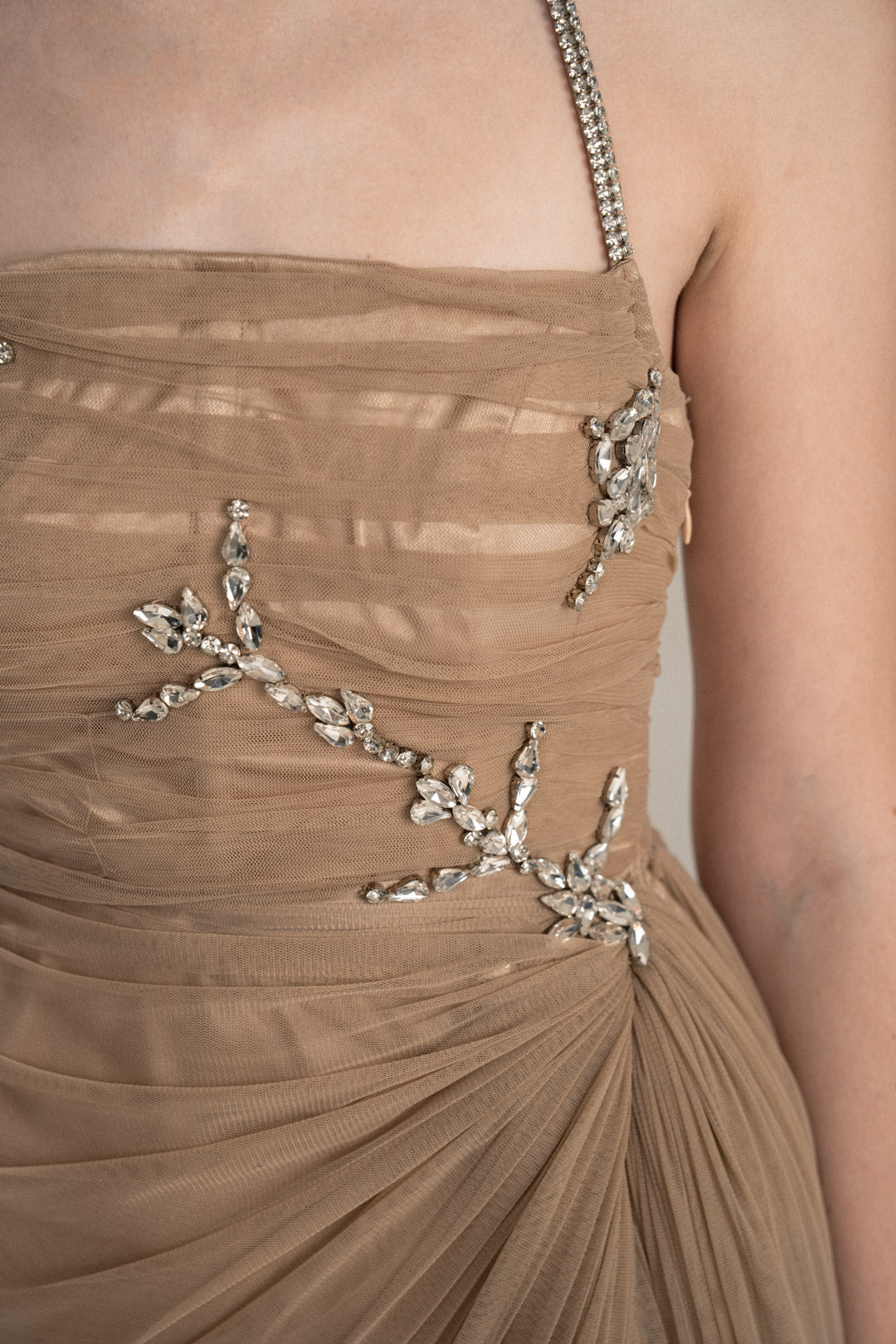 BEIGE DRAPED GOWN WITH RHINESTONE EMBELLISHMENTS