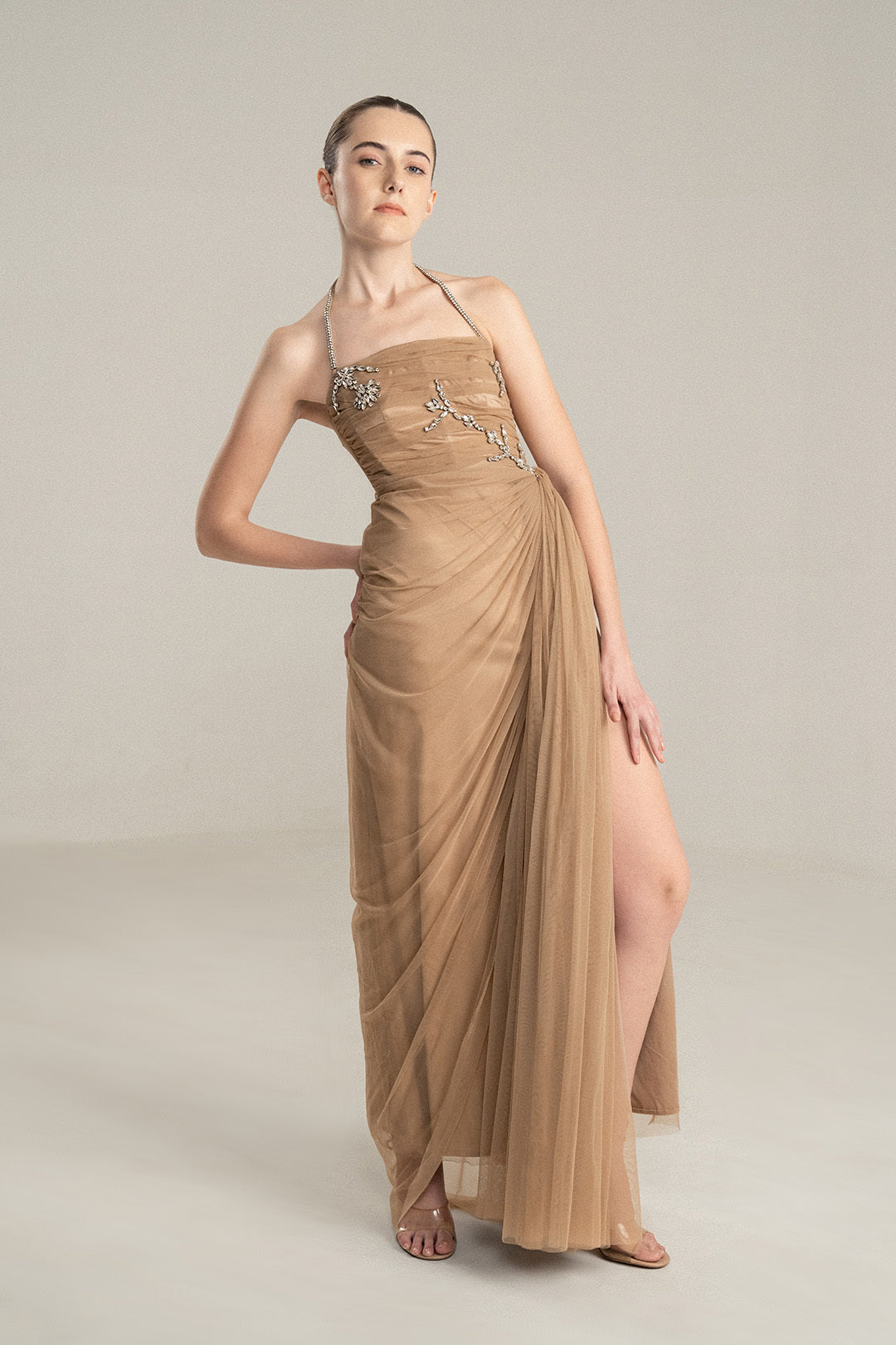 BEIGE DRAPED GOWN WITH RHINESTONE EMBELLISHMENTS