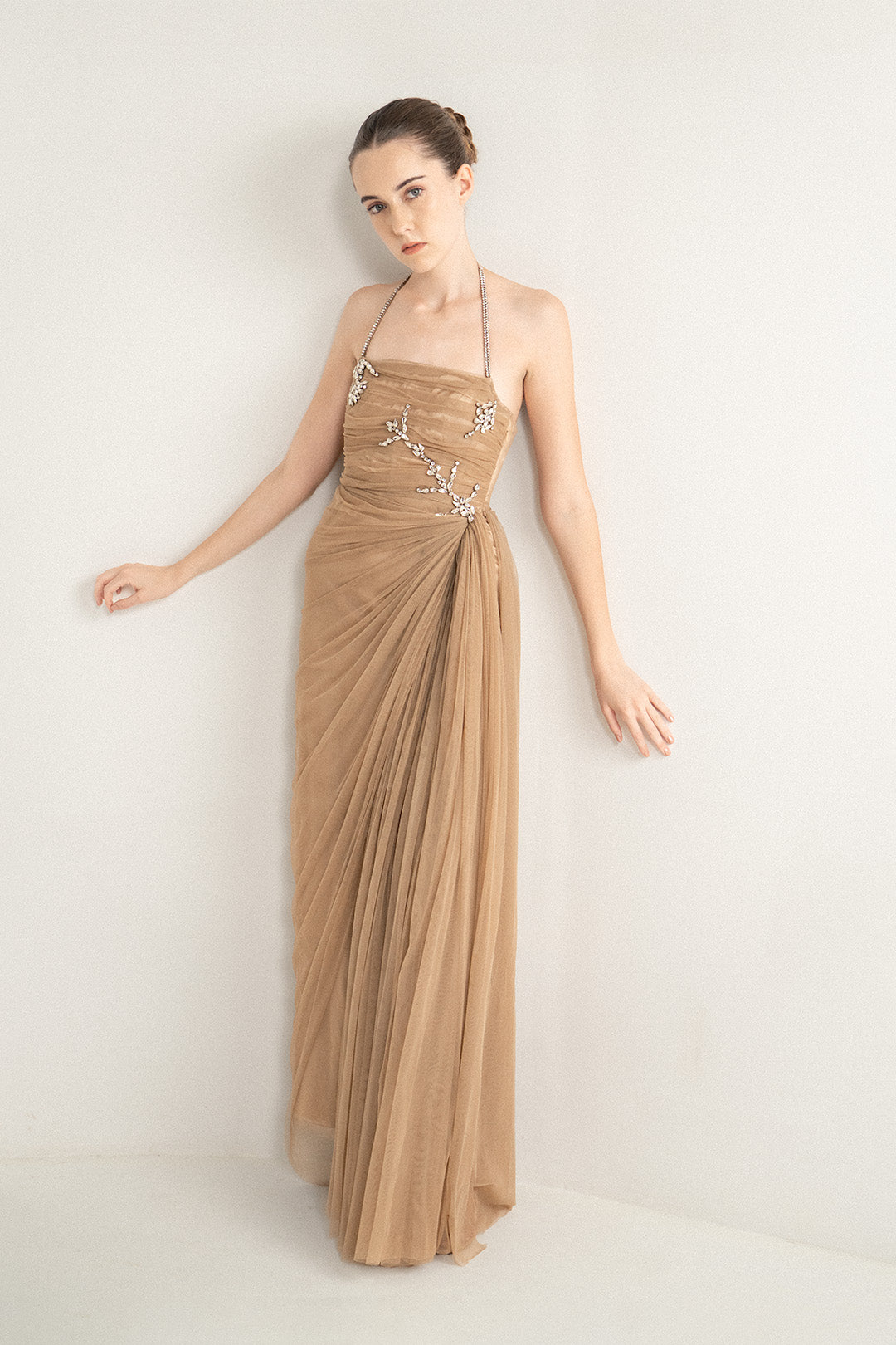 BEIGE DRAPED GOWN WITH RHINESTONE EMBELLISHMENTS