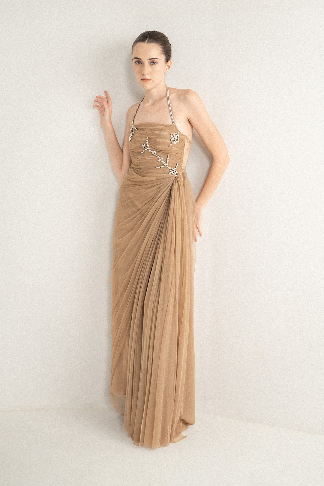 BEIGE DRAPED GOWN WITH RHINESTONE EMBELLISHMENTS
