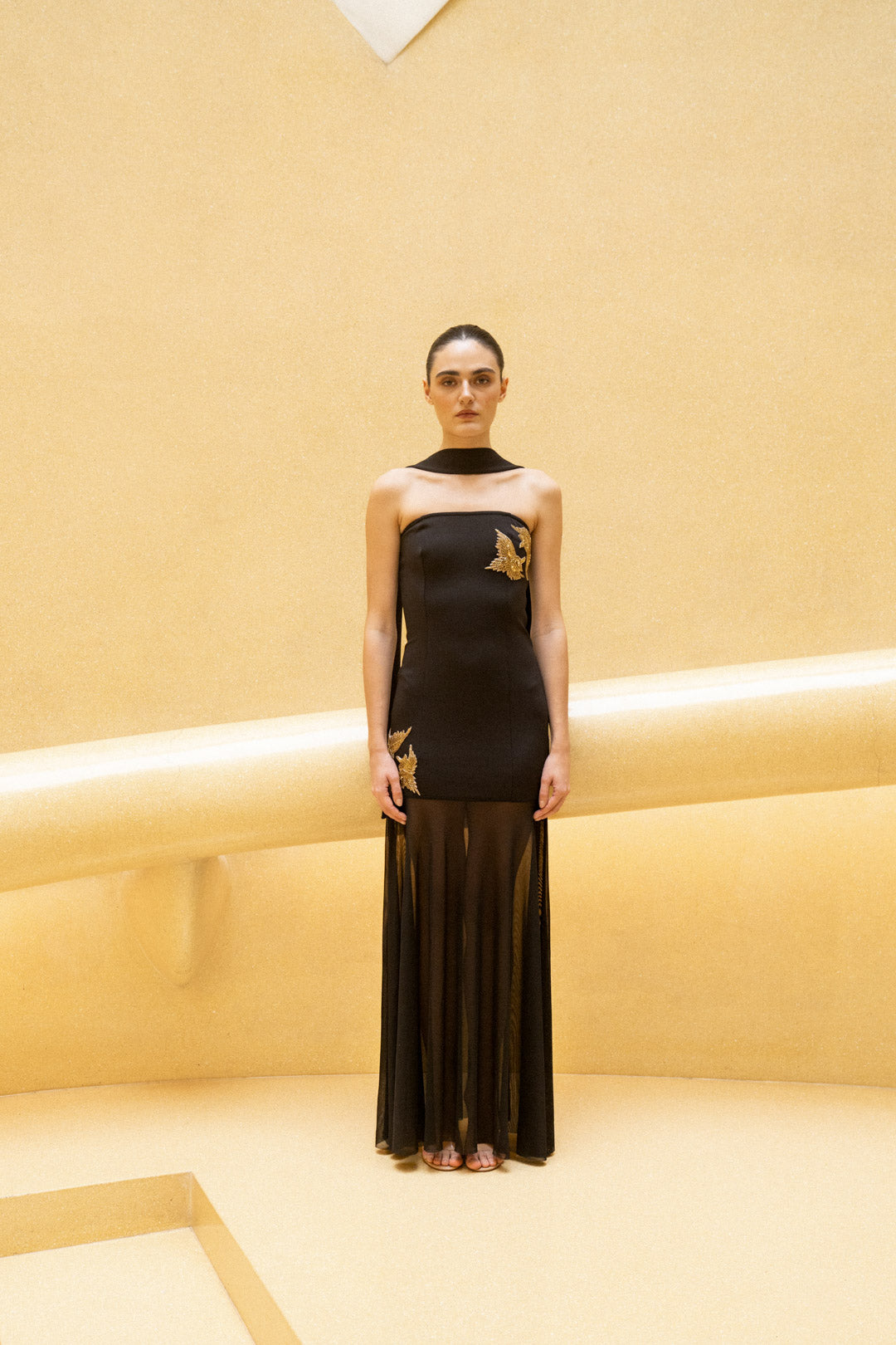 BLACK STRAPLESS SHEER PANEL GOWN WITH GOLD EMBROIDERY