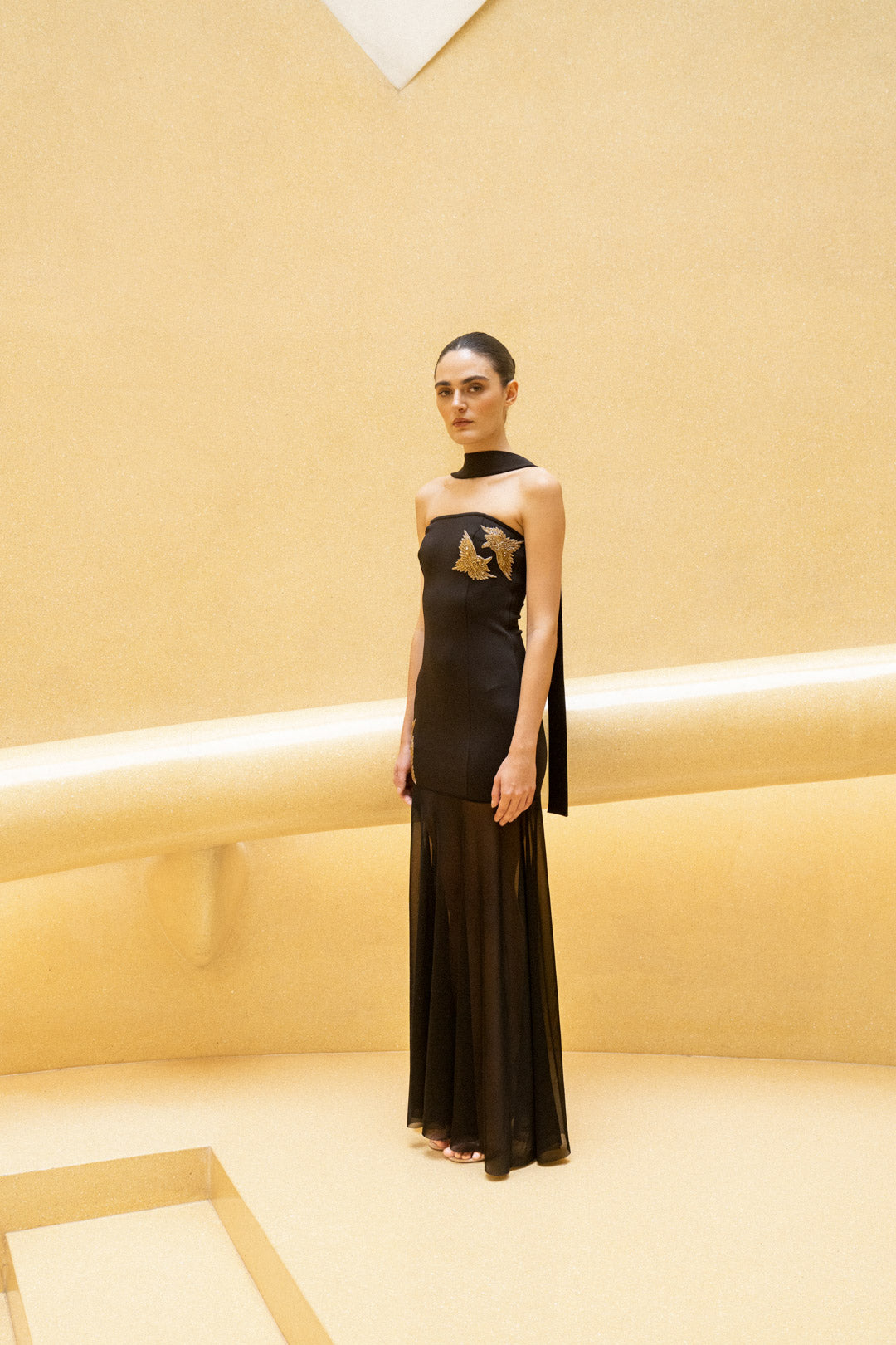 BLACK STRAPLESS SHEER PANEL GOWN WITH GOLD EMBROIDERY