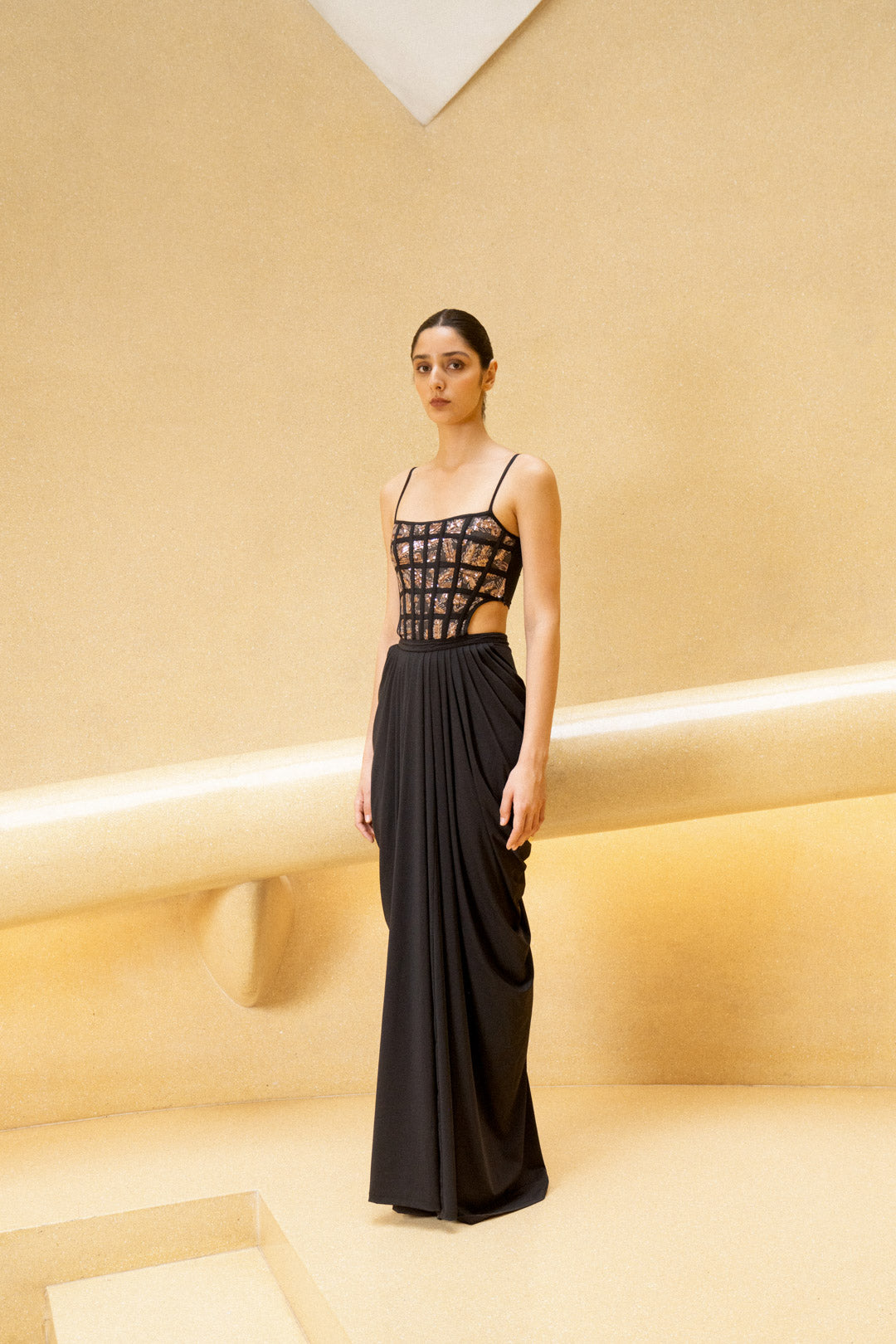BLACK DRAPED GOWN WITH GRID CORSET BODICE