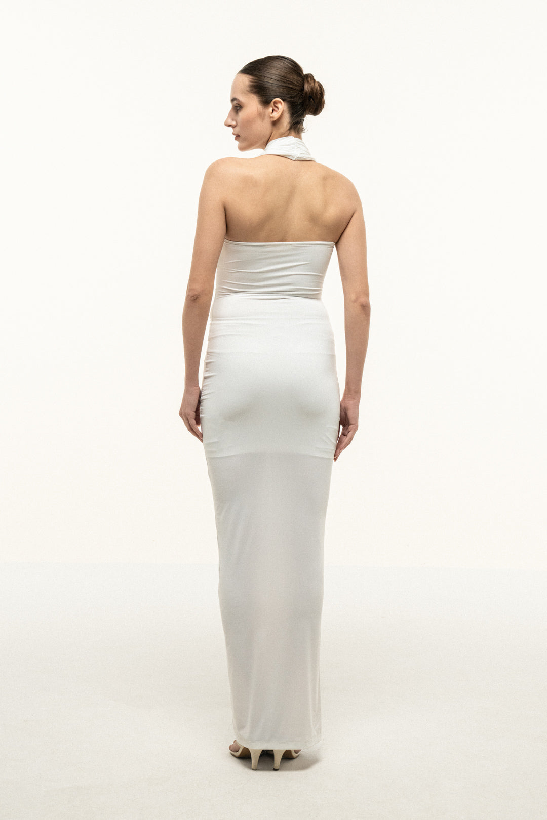 WHITE HALTER DRAPED COLUMN DRESS WITH GOLD TRIM