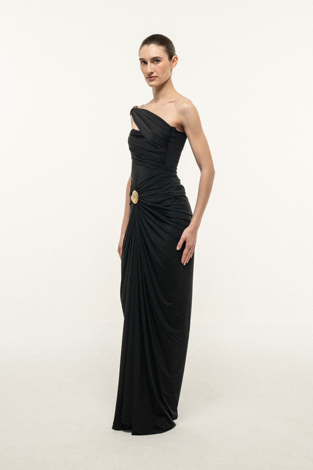 BLACK ONE-SHOULDER DRAPED MAXI DRESS WITH GOLD SHELL DETAIL