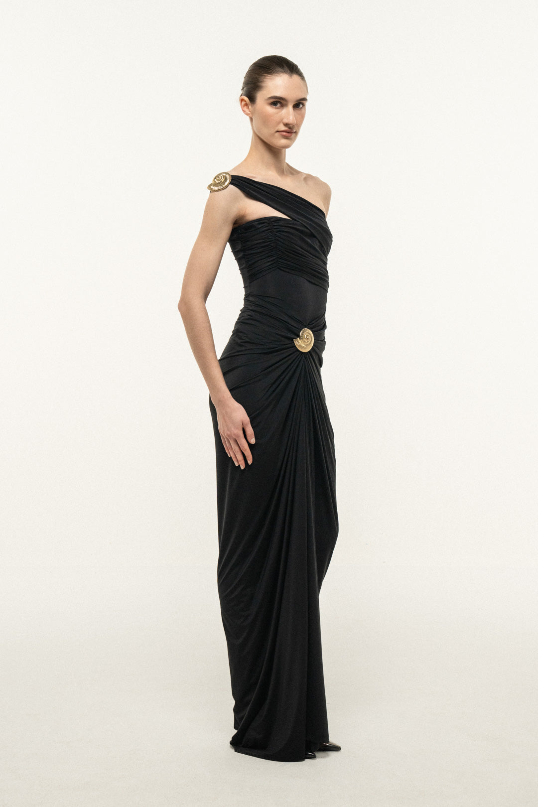 BLACK ONE-SHOULDER DRAPED MAXI DRESS WITH GOLD SHELL DETAIL