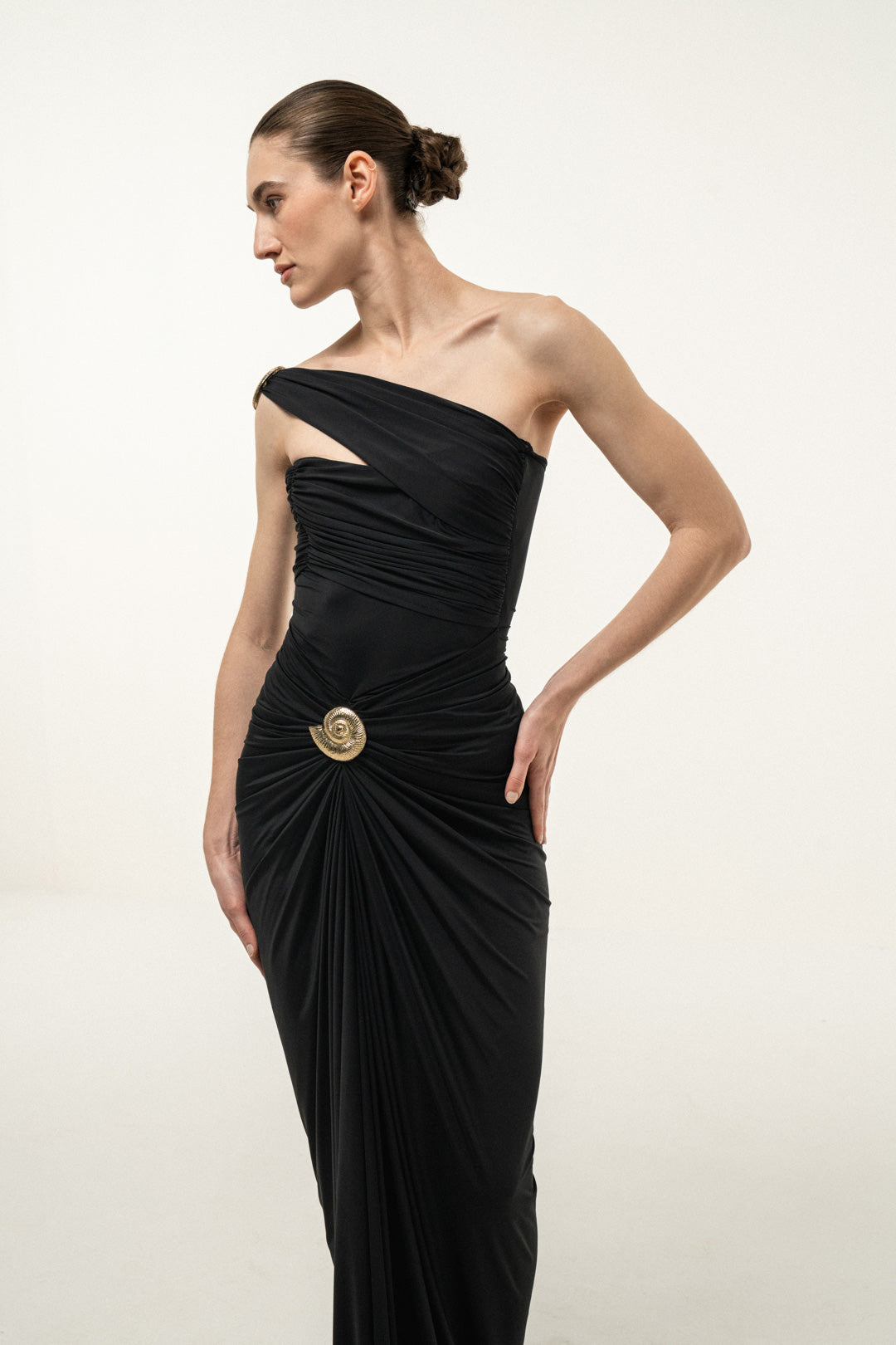 BLACK ONE-SHOULDER DRAPED MAXI DRESS WITH GOLD SHELL DETAIL