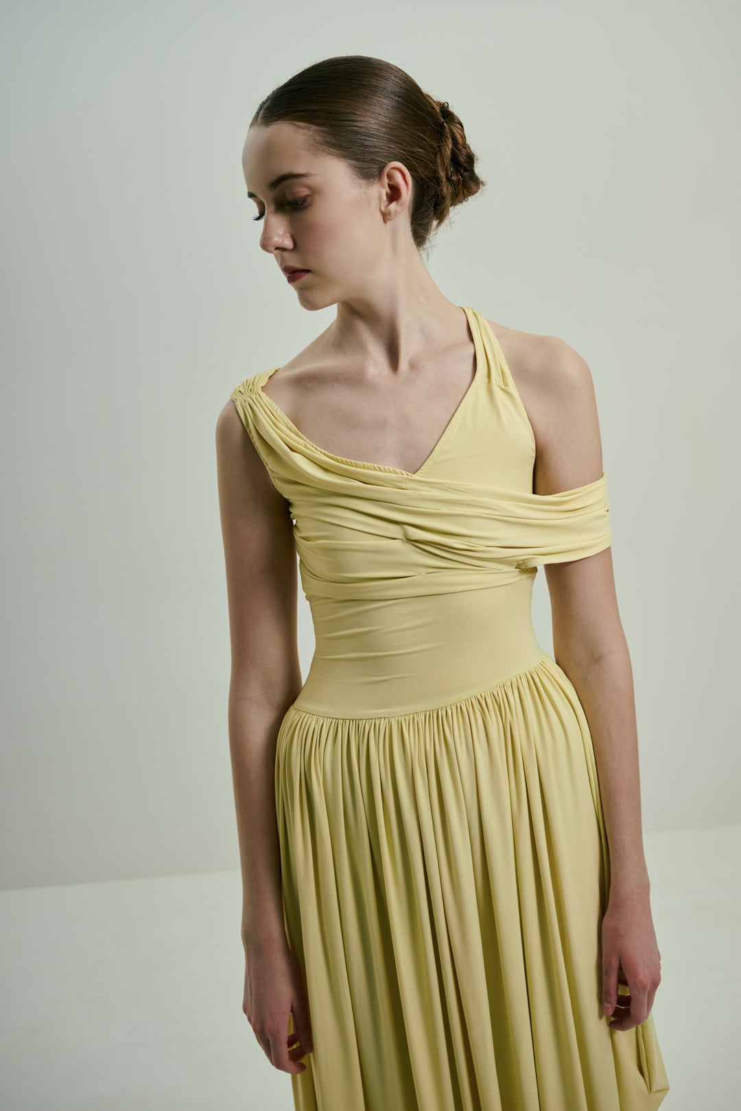 SOFT BUTTER YELLOW DRAPED MIDI DRESS WITH ASYMMETRIC NECKLINE