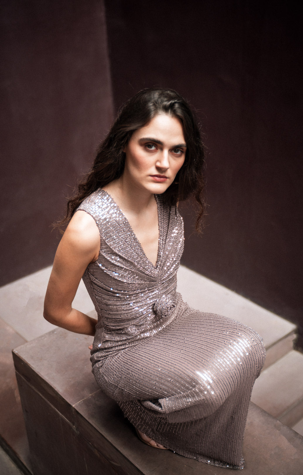 BROWN SLEEVELESS SEQUIN GOWN WITH KNOT DETAIL