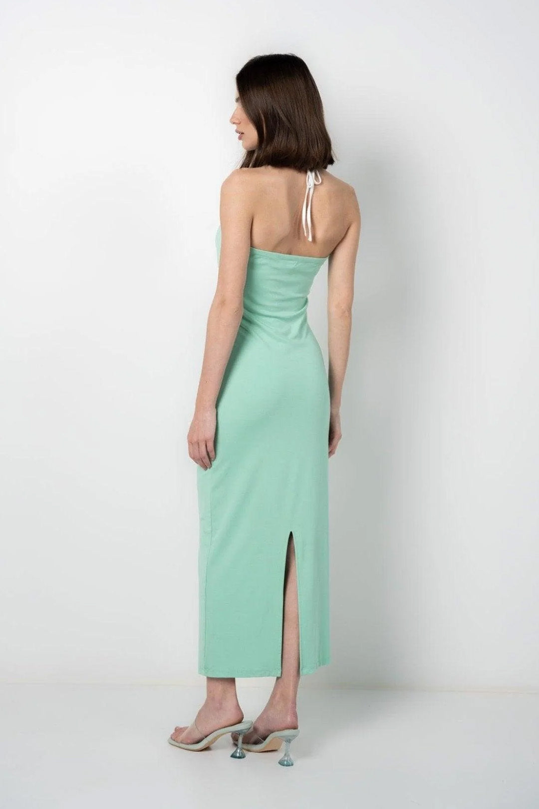 STRIKING AQUA 
CUTOUT DRESS